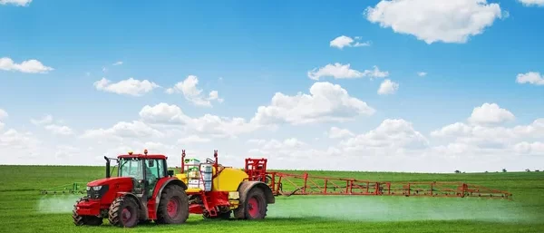 depositphotos_552597156-stock-photo-tractor-spray-fertilizer-spraying-pesticides